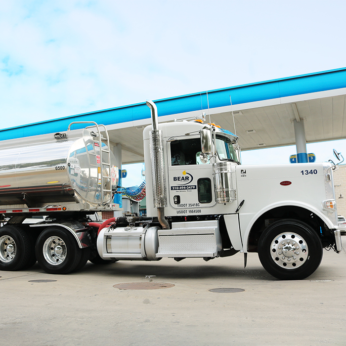 Bear Oil truck at gas station