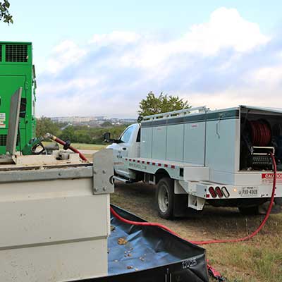 Bear Oil truck providing a diesel fuel delivery